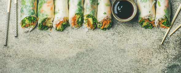 Flat-lay of vegan spring, summer rice paper rolls, wide composition - Stock Photo - Images