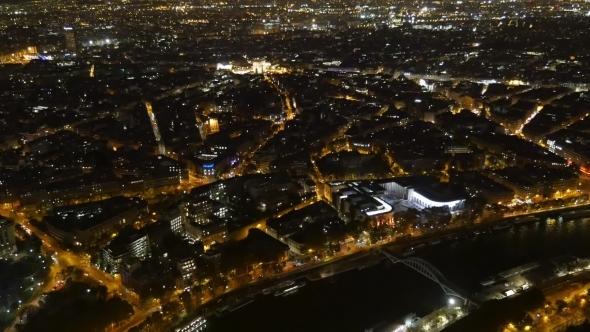 Aerial of Paris at Night with Golden Embankments of the Seine in Autumn