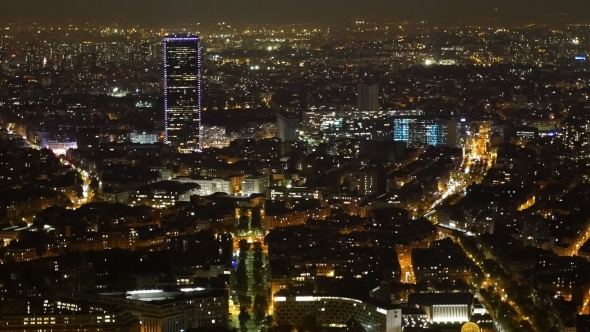 Aerial of Paris at Night with a Skyscrapper in the Background in Autumn