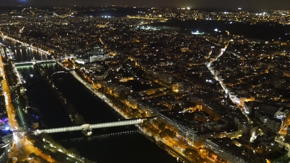 Aerial of Paris at Night with Illuminateriverbanks of the Seine in Autumn
