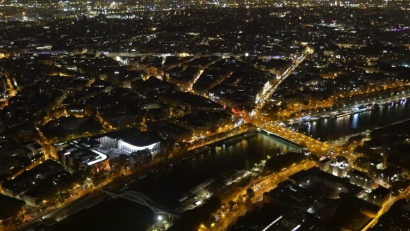 Paris at Night From the Eiffel Tower Golden Embankments of the Seine Look Fine