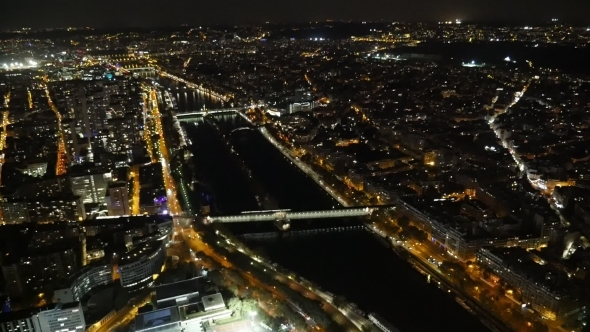 Aerial of Paris at Night with Golden Riverbanks of the Seine in Autumn