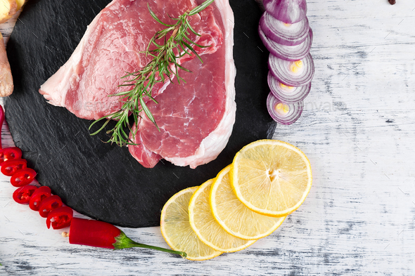 Raw pork meat with spice ingredient - Stock Photo - Images