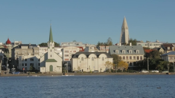 Picturesque Sunny View of Downtown of Reykjavik, Water of Blue Lake