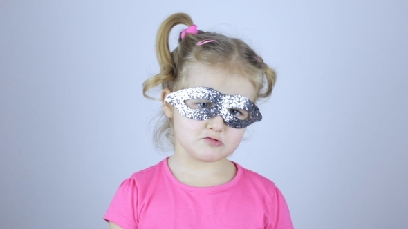 Cute Young Girl in Holiday Mask