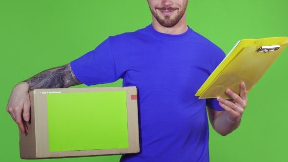 Deliveryman Holding Copyspace Cardboard Box and Clipboard alt