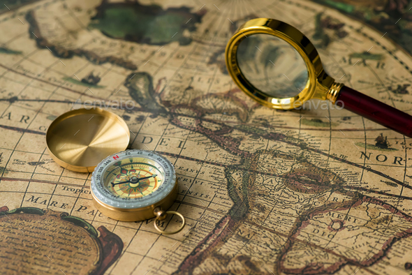Retro compass with old map and magnifier - Stock Photo - Images