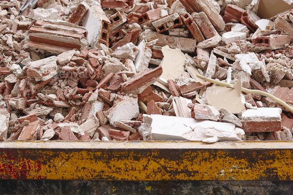 Removal of debris. Construction waste. Building demolition. Devastation background - Stock Photo - Images