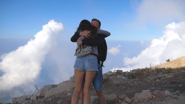 Man and Woman Standing on the Edge of Beautiful Canyon, Victoriously ...