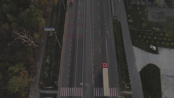 Aerial View of a Traffic Driving on a Motorway Through the Countryside