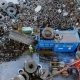 Waste Recycling Plant. The Truck Crane Loads Old Tires Into the Shredder for Recycling - VideoHive Item for Sale