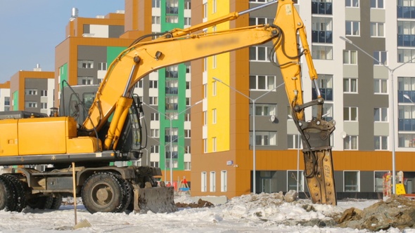 Hydrohammer Machine Working at Building Site