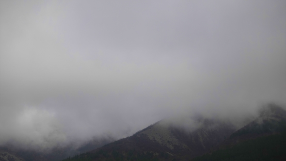 Clouds Encircles a Caucasian Mountains
