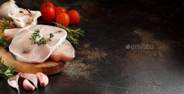 Two shark steak with vegetables and herbs Stock Photo by katrinshine