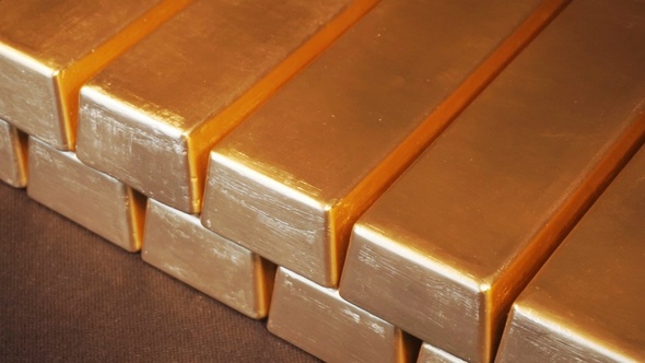 Gold Bullion Bars Moving Stacks of Gold Bars