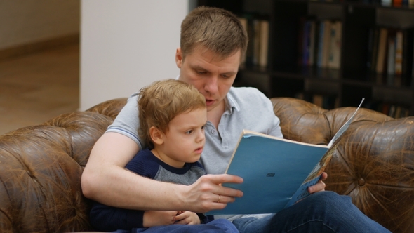 Father and Son Reading a Book