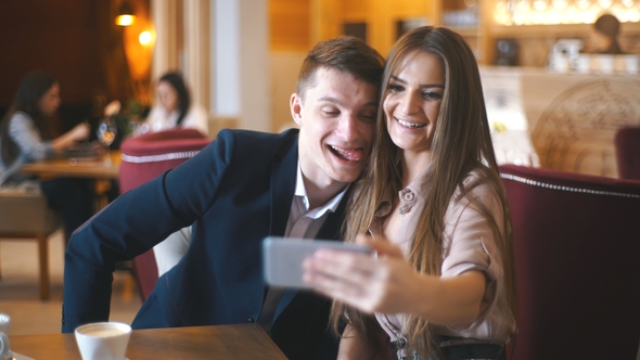 Couple Making Selfie with Front Camera.