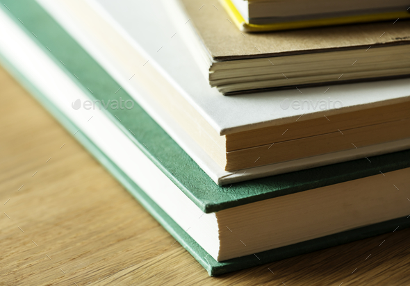 Closeup of stack of antique books educational, academic and literary concept - Stock Photo - Images