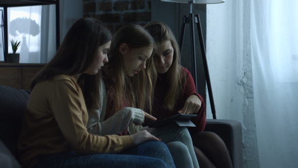 Shopaholic Girls Shopping Online with Digital Tablet alt