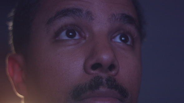 Mixed Race Man Watching Tv alt