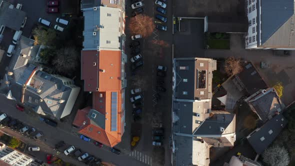 Aerial Birds Eye Overhead Top Down View of Straight Street in Morning Light alt