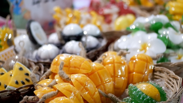 Colorful Thai Handmade Soap in the Form of Exotic Fruit on the Counter Night Market alt