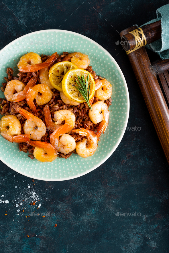 Prawns roasted on grill and rice - Stock Photo - Images