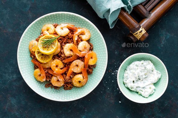Prawns roasted on grill and rice - Stock Photo - Images