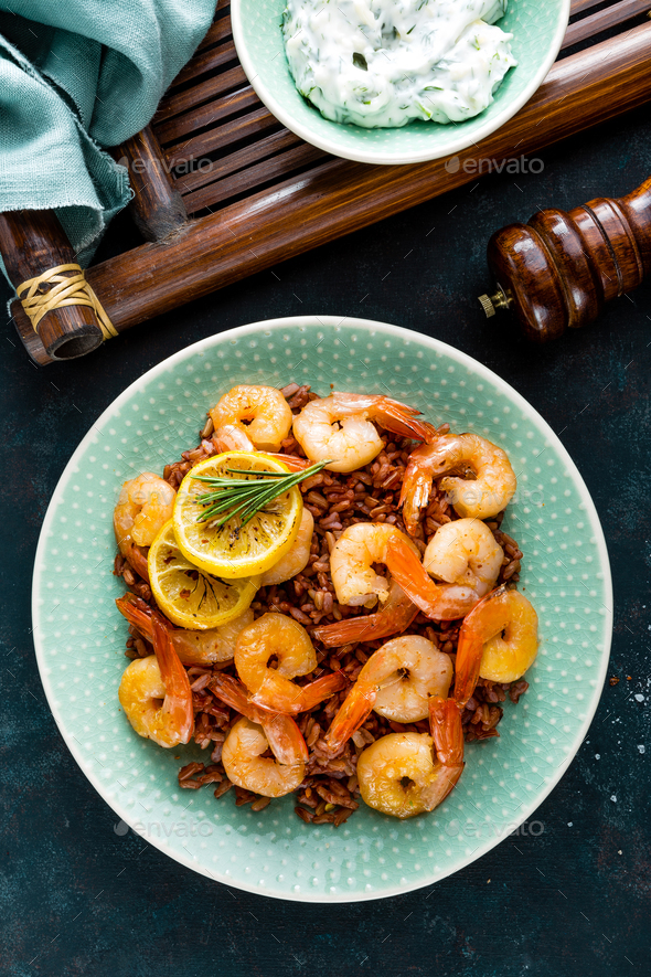 Prawns roasted on grill and rice - Stock Photo - Images