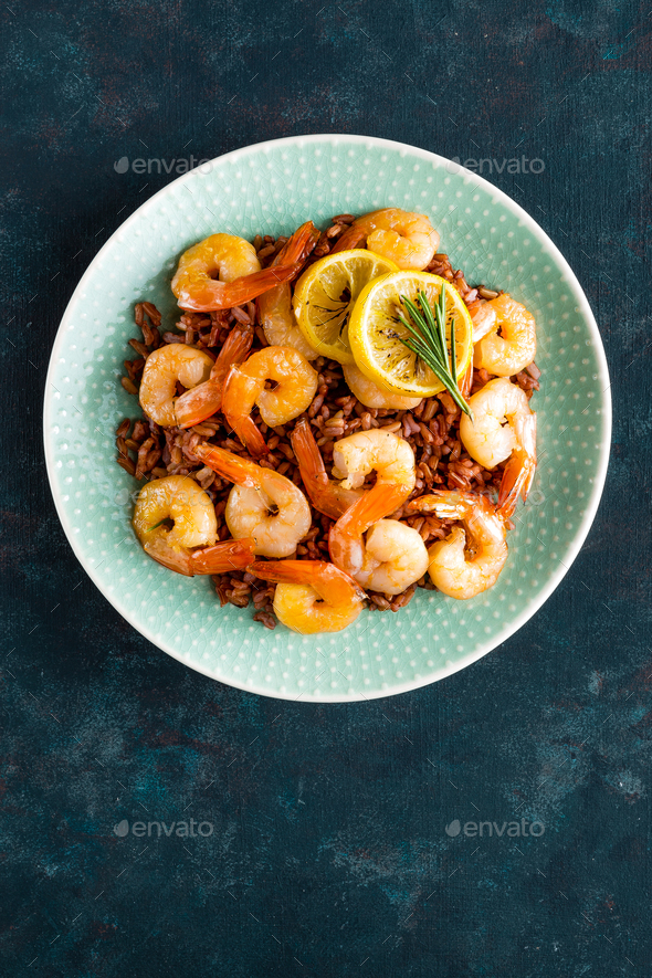 Prawns roasted on grill and rice - Stock Photo - Images