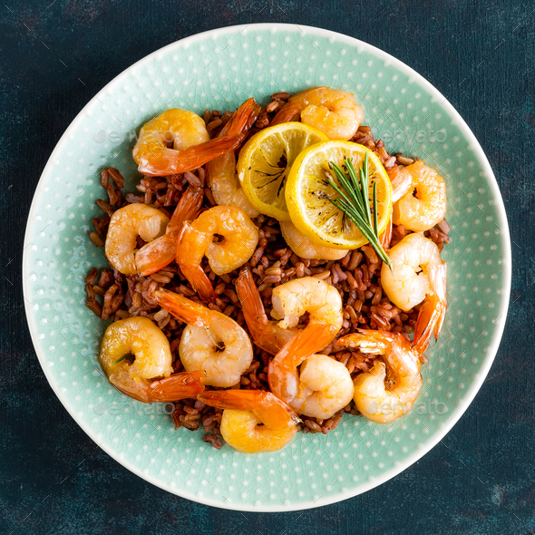 Prawns roasted on grill and rice - Stock Photo - Images
