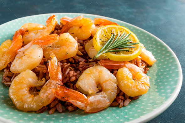 Prawns roasted on grill and rice - Stock Photo - Images