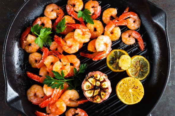 Prawns roasted on grill frying pan Stock Photo by sea_wave | PhotoDune