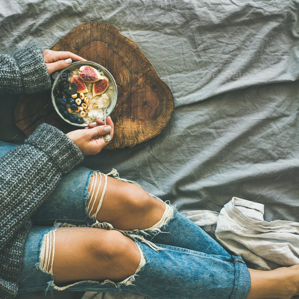 Healthy winter breakfast in bed concept, top view, square crop - Stock Photo - Images