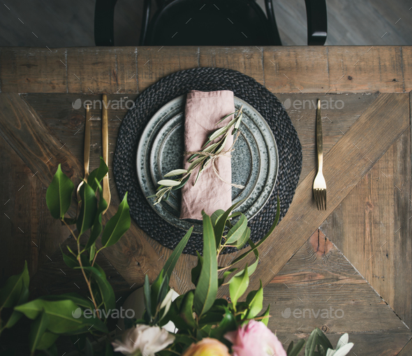 Flat-lay of Spring Easter Table setting over vintage wooden background - Stock Photo - Images