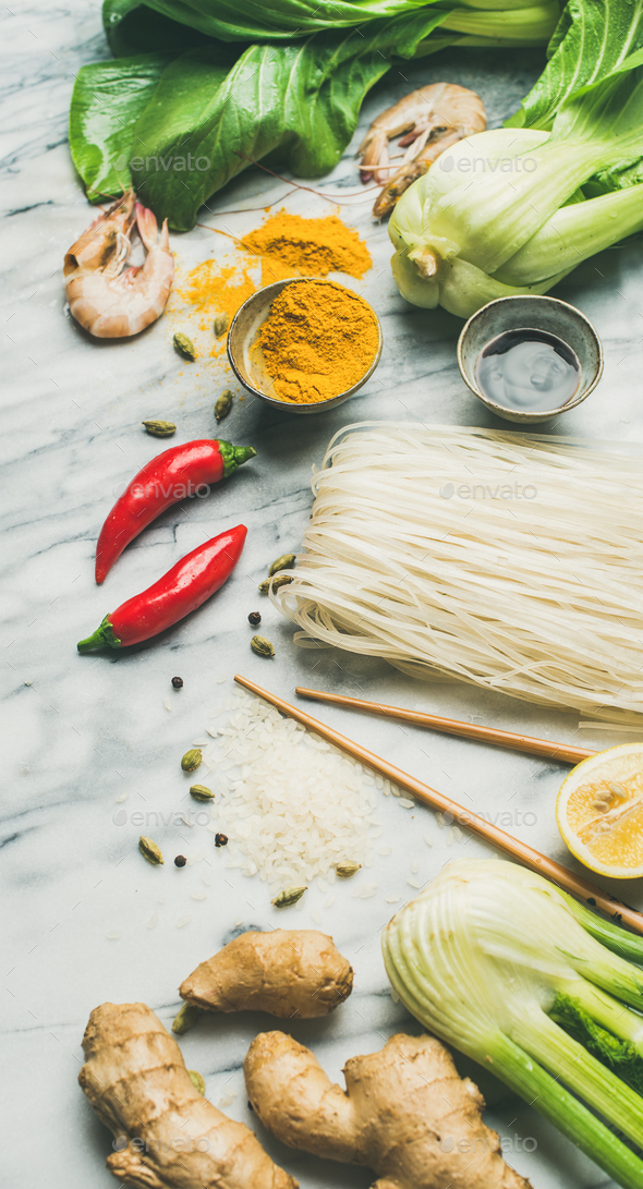 Asian cuisine ingredients over grey marble background - Stock Photo - Images