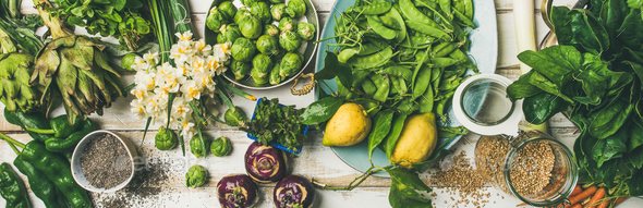 Spring healthy vegan food cooking ingredients, top view, wide composition - Stock Photo - Images