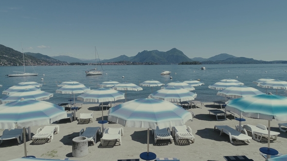 Beach Italy Como Maggiore Lake Holidays Summer Vacations Drone Flight Umbrella alt