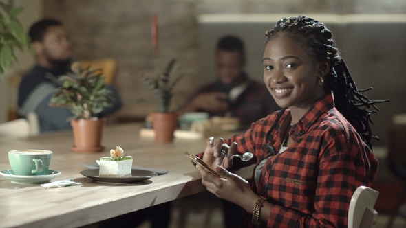 Casual Black Woman in Relaxation alt