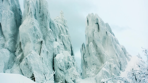 Snowy Rock In The Forest By Baldasaridstock Videohive