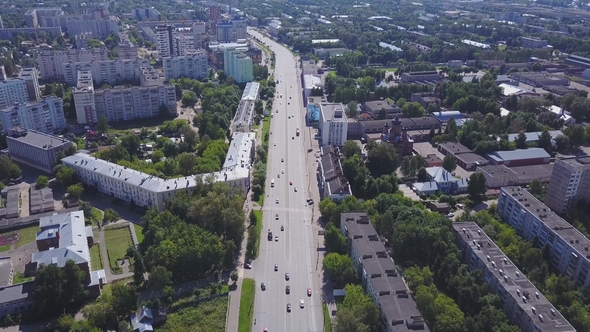 A View From the Air To the City Avenue with the Traffic of Cars and Pedestrians