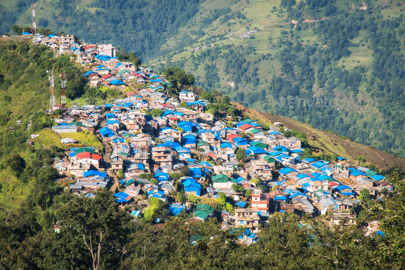 Beautiful small village on the mountain at sunset - Stock Photo - Images