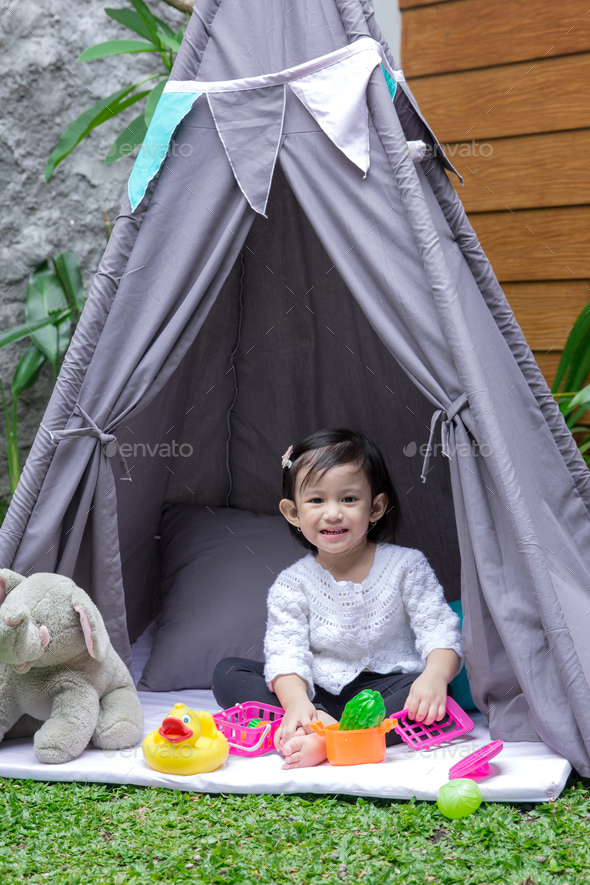 A girl and her tent Stock Photo by odua | PhotoDune