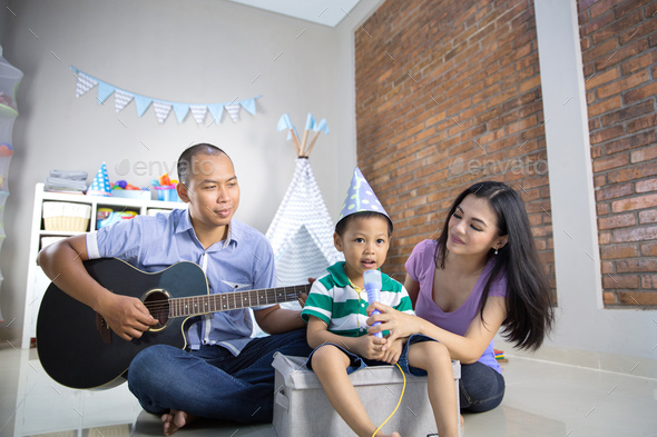 Playing music with son concept Stock Photo by odua | PhotoDune