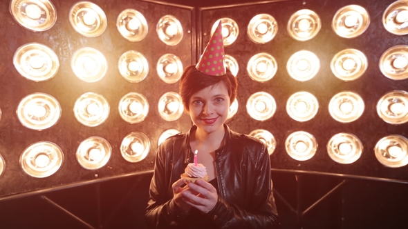 Happy Girl Smiling Girl Holding Her Cake in Both Hands and Celebrating Her Birthday