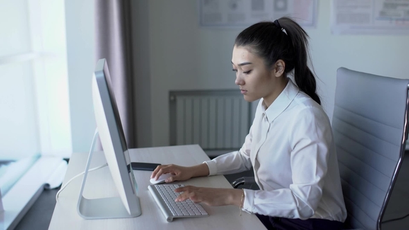 Beautiful Asian Female Person Working In Front Of Monitor Office Play Preview Video