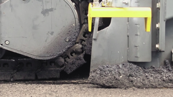 Road Construction Applying New Hot Asphalt alt