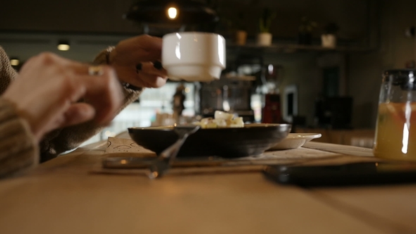 Woman Is Drinking Black Coffee