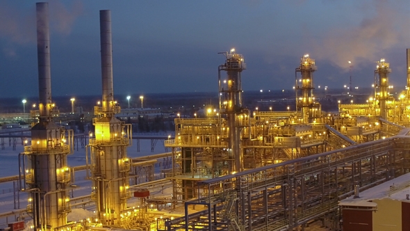 A Huge Oil Refinery at Night alt