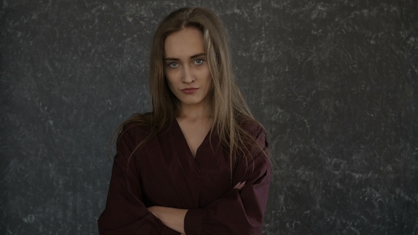 Girl Is Standing with Crossed Arms